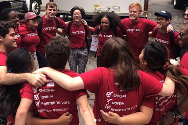 students in circle at Harvard votes challenge 